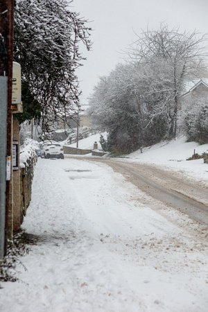 Snow covering the main road running through a village in the U.K.の写真素材