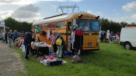 Worksop, Nottinghamshire, United Kingdom-June 12 2022: Oldcotes car boot and Sunday market. People walking round looking at stalls.の写真素材