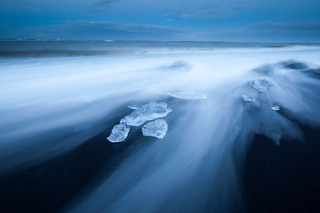 Iceberg fragment on JÃ¶kulsÃ¡rlÃ³n beach, South Iceland