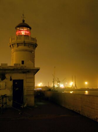 lighthouse in the nightの写真素材