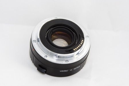 A converter that fit in a lens to multiply its focal lengthの写真素材