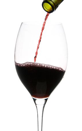 a clear glass of red wine isolated on white backgroundの写真素材
