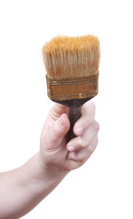 hand holding a painting brush isolated on withe backgroundの写真素材