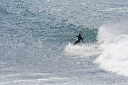 image of people practicing surf in the beach