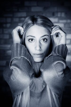 a portrait of a real beautiful young surprised girlの写真素材