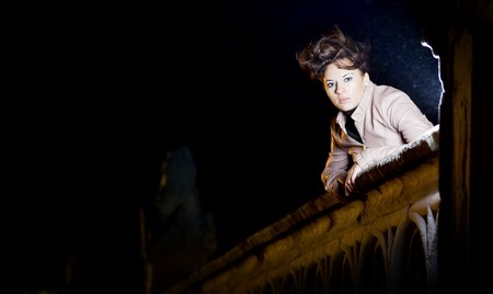 misterious image of a young beautiful girl at night