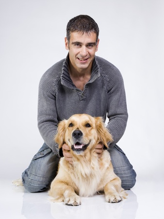 attractive man and his petの写真素材
