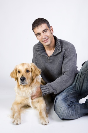 attractive man and his petの写真素材