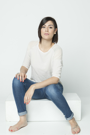 real girl in natural poses during a shootingの写真素材