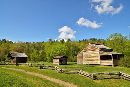 Historical homestead buildings with rustic wooden fence in the Smokey Mountain N.P.の写真素材