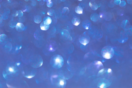 Abstract blue bokeh of lights on backgroundの写真素材