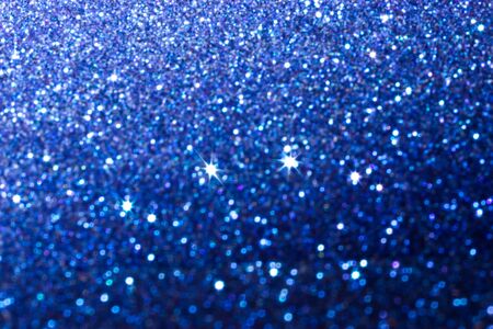 Abstract blue bokeh of lights on backgroundの写真素材