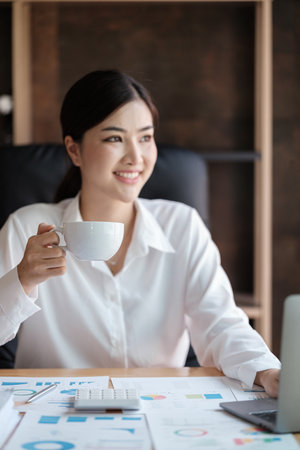 Smart Woman in the Office Focus on Coffee Cupの写真素材