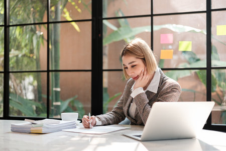 Smart Woman working in the garden office.の写真素材
