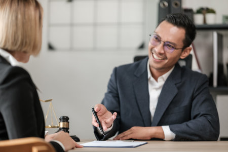 Business and Male lawyers or judge consult having team meetings with clients, Law, and Legal services concept. Customer service good cooperation in office.の写真素材