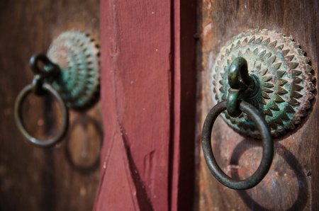 Handle of the very old temple door,Thailandの写真素材