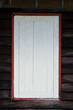 An old window of thai house, East of Thailand の写真素材
