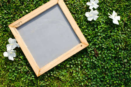 Notepad frame with nature background の写真素材
