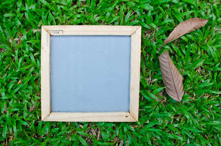 Notepad frame with nature background の写真素材