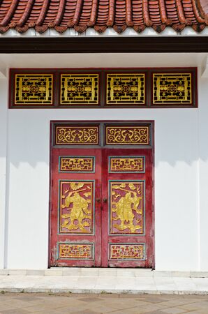 Old door of old chinese temple の写真素材