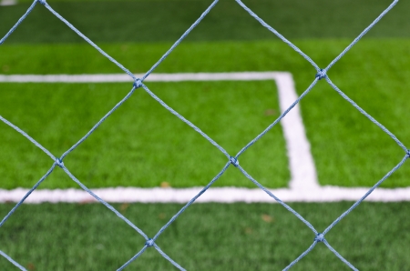Empty field and the netの写真素材