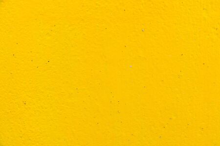 Yellow wall for backgroundの写真素材