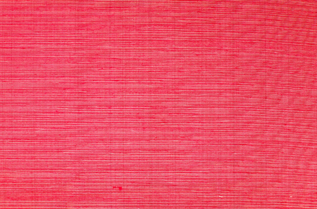 Rough old red paper for background useの写真素材