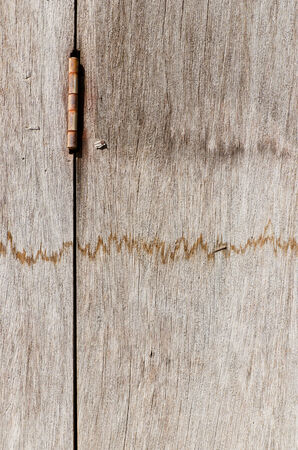 Old rusty hardwood door for backgroundの写真素材