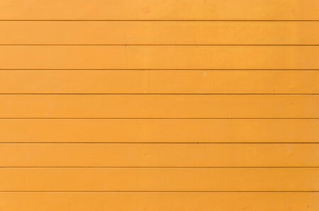 Orange color wood wallの写真素材