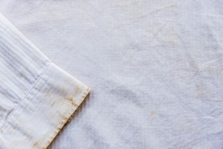 Dirty white shirt closeup for background usの写真素材