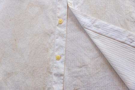 Dirty white shirt closeup for background useの写真素材