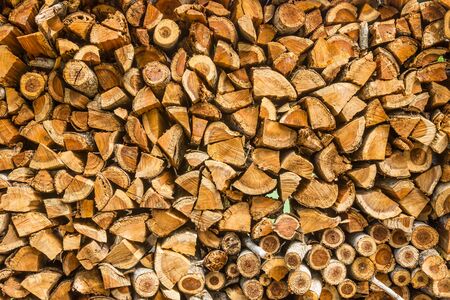Closeup pattern of cutting wood stack for backgroundの写真素材
