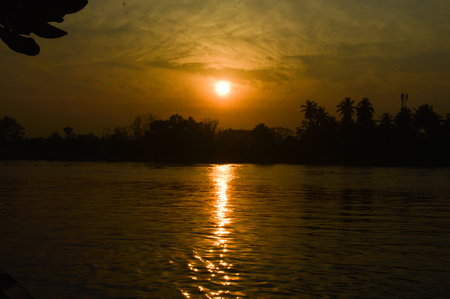 The sun was falling beyond the horizon.の写真素材