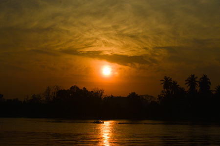 The sun was falling beyond the horizon.の写真素材