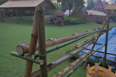 Artificial colors of bamboo: a shed, torches, floating vegetable plots.の写真素材