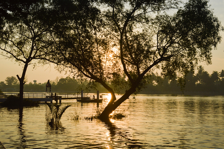 The sun was falling beyond the horizon.の写真素材