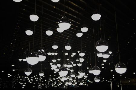 Light bulb in a dark place.の写真素材