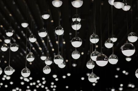 Light bulb in a dark place.の写真素材