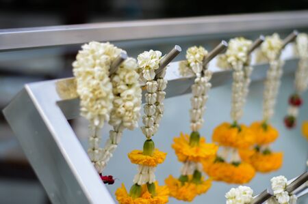 flower garland Worship Buddha statueの写真素材