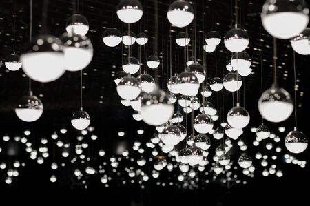 Light bulb in a dark place.の写真素材