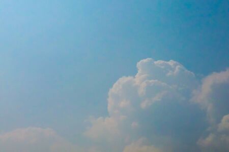 Blue sky with clouds backgroundsの写真素材