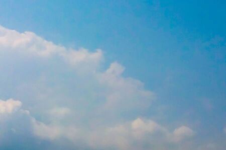 Blue sky with clouds backgroundsの写真素材