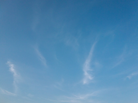 Blue sky with clouds backgroundの写真素材