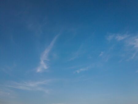 Blue sky with clouds backgroundの写真素材
