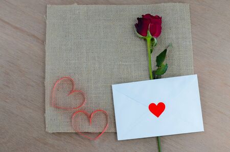 send a letter and red roses is A love confession For Valentine's Dayの写真素材