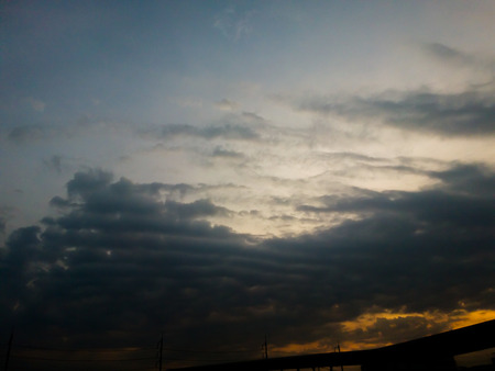 Dark Sky,Light shining, sunset, 
The sky is darkの写真素材