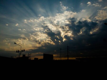 Dark Sky,Light shining, sunset, 
The sky is darkの写真素材