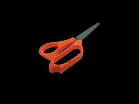 Scissors on a black background.の写真素材
