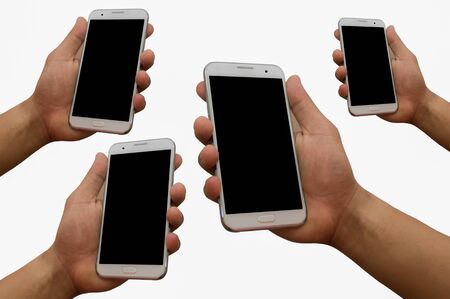 Hand holding  mobile smartphone blank black screenの写真素材