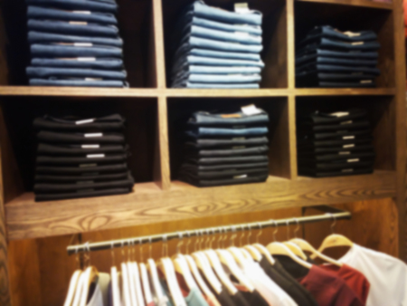 blurred photo, Blurry image, Jeans Denim pants on the shelvesの写真素材